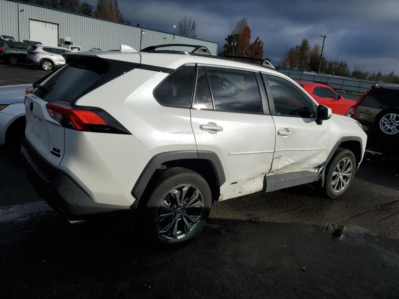 2022 Toyota RAV 4 VIN JTMB6RFV9ND529574 Copart auction photo, side damage thumbnail 3