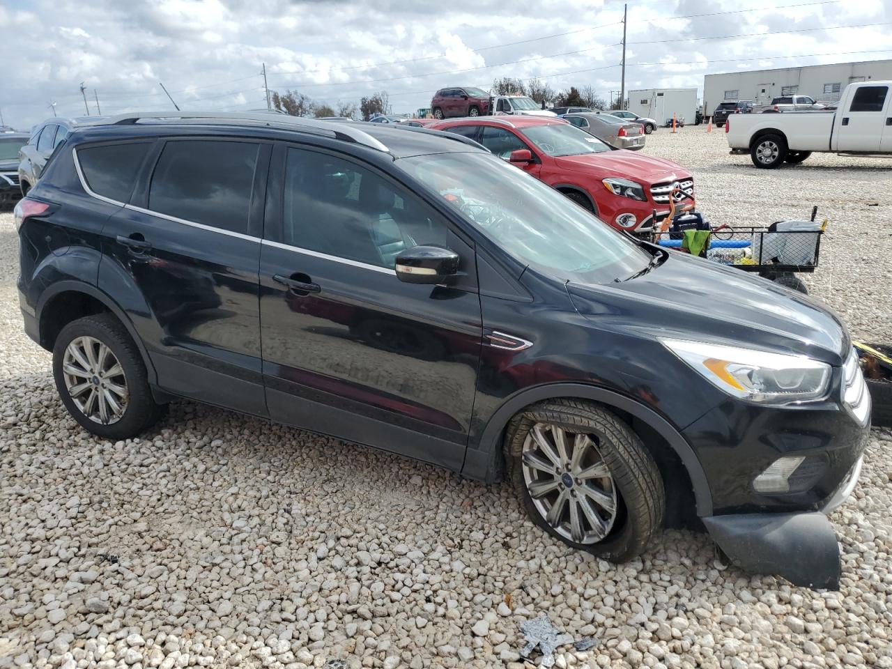 2017 Ford Escape VIN 1FMCU0JD1HUD93140 Copart auction photo, all over damage thumbnail 4