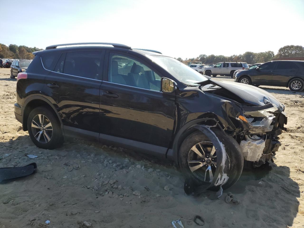 2017 Toyota RAV 4 VIN 2T3RFREV6HW610832 Copart auction photo, front end / minor dent/scratches damage thumbnail 4