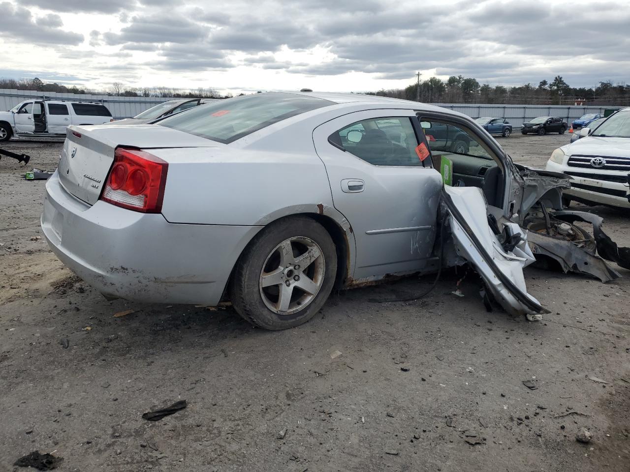 2009 Dodge Charger VIN 2B3KA33V99H590465 Copart auction photo, side / front end damage thumbnail 3