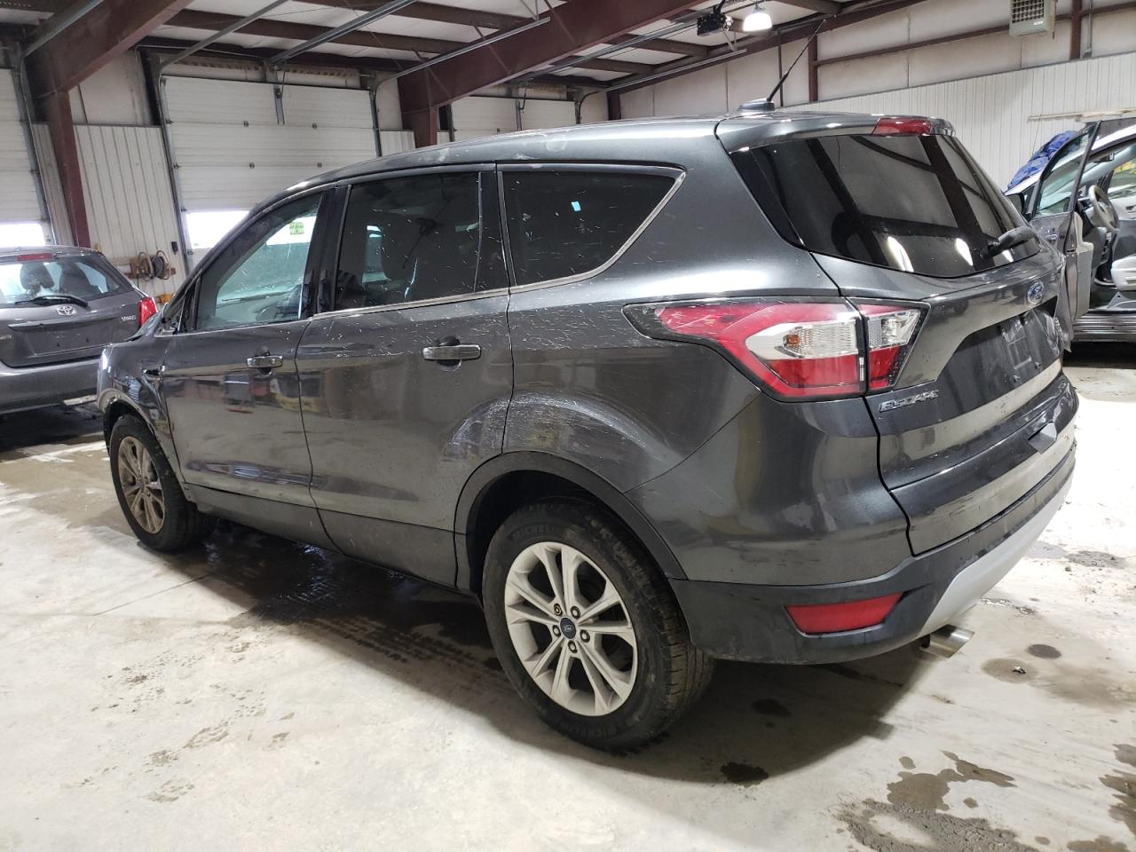 2017 Ford Escape VIN 1FMCU0GDXHUA20640 Copart auction photo, all over damage thumbnail 2