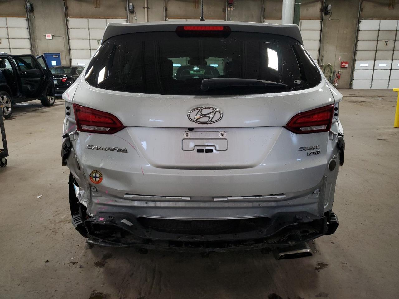2018 Hyundai Santa Fe VIN 5XYZTDLB5JG570011 Copart auction photo, rear end damage thumbnail 6