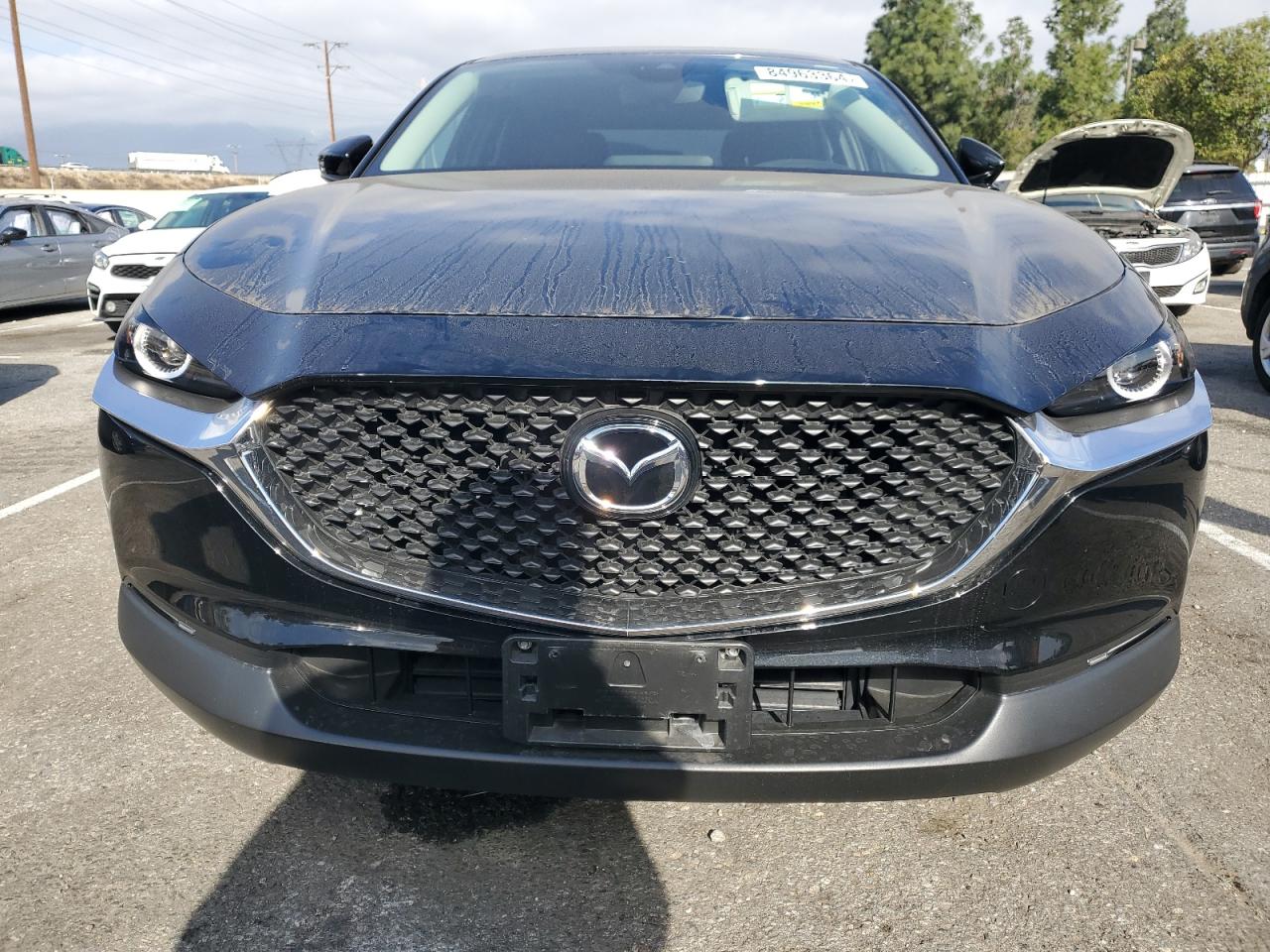 2023 Mazda CX-30 VIN 3MVDMBAM0PM520496 Copart auction photo, side damage thumbnail 5
