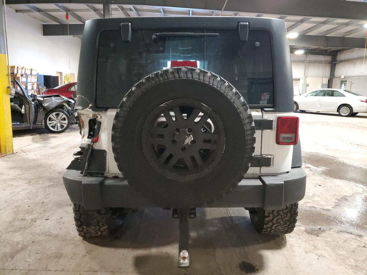 2012 Jeep Wrangler VIN 1C4BJWDGXCL270355 Copart auction photo, side / rear end damage thumbnail 6