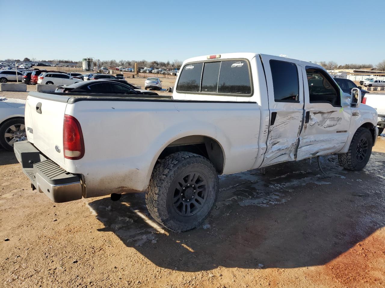 2000 Ford F250 VIN 1FTNW20F9YEA69224 Copart auction photo, side / minor dent/scratches damage thumbnail 3
