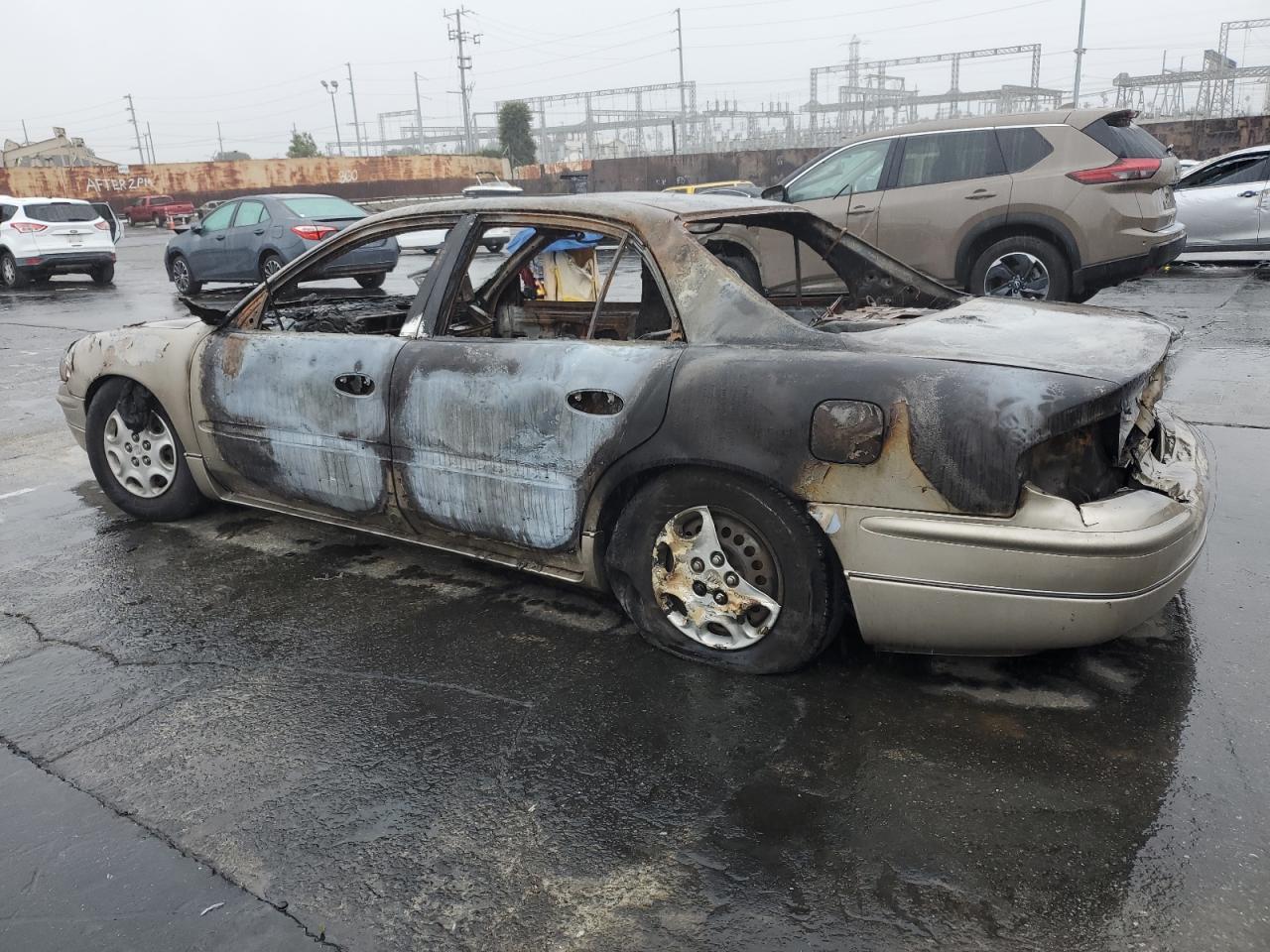 2001 Buick Regal VIN 2G4WB52K811228233 Copart auction photo, burn damage thumbnail 2
