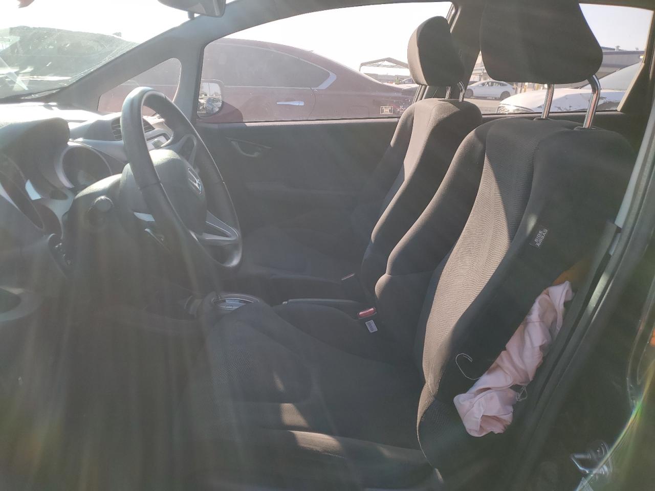 2011 Honda Fit VIN JHMGE8H54BC004549 Copart auction photo, all over damage thumbnail 7