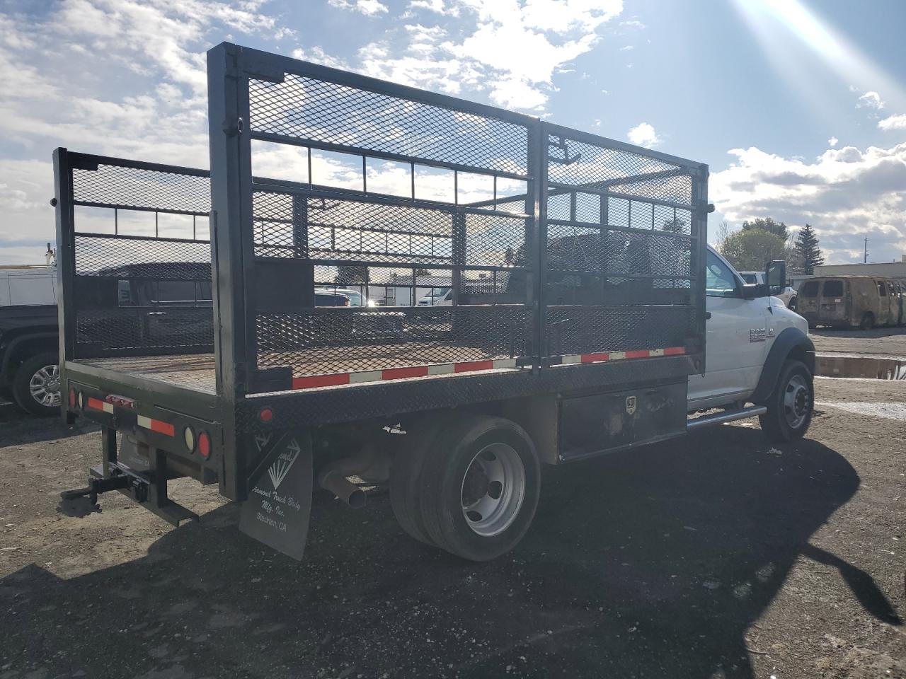 2016 RAM 5500 VIN 3C7WRMBL6GG109702 Copart auction photo, minor dent/scratches damage thumbnail 3
