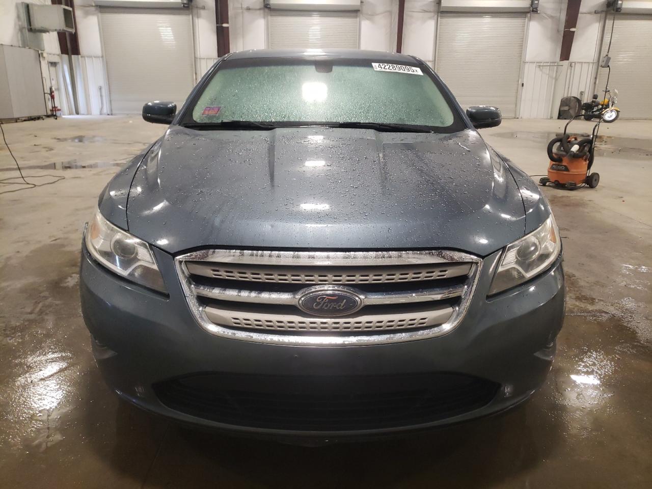 2010 Ford Taurus VIN 1FAHP2HW4AG145673 Copart auction photo, front end damage thumbnail 5