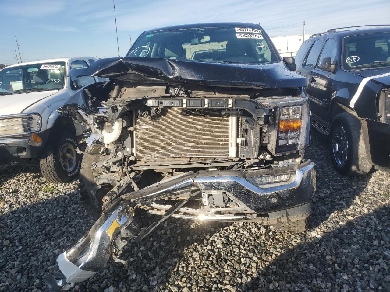 2023 Ford F-150 VIN 1FTFW1E5XPFB20723 Copart auction photo, front end / rear end damage thumbnail 5