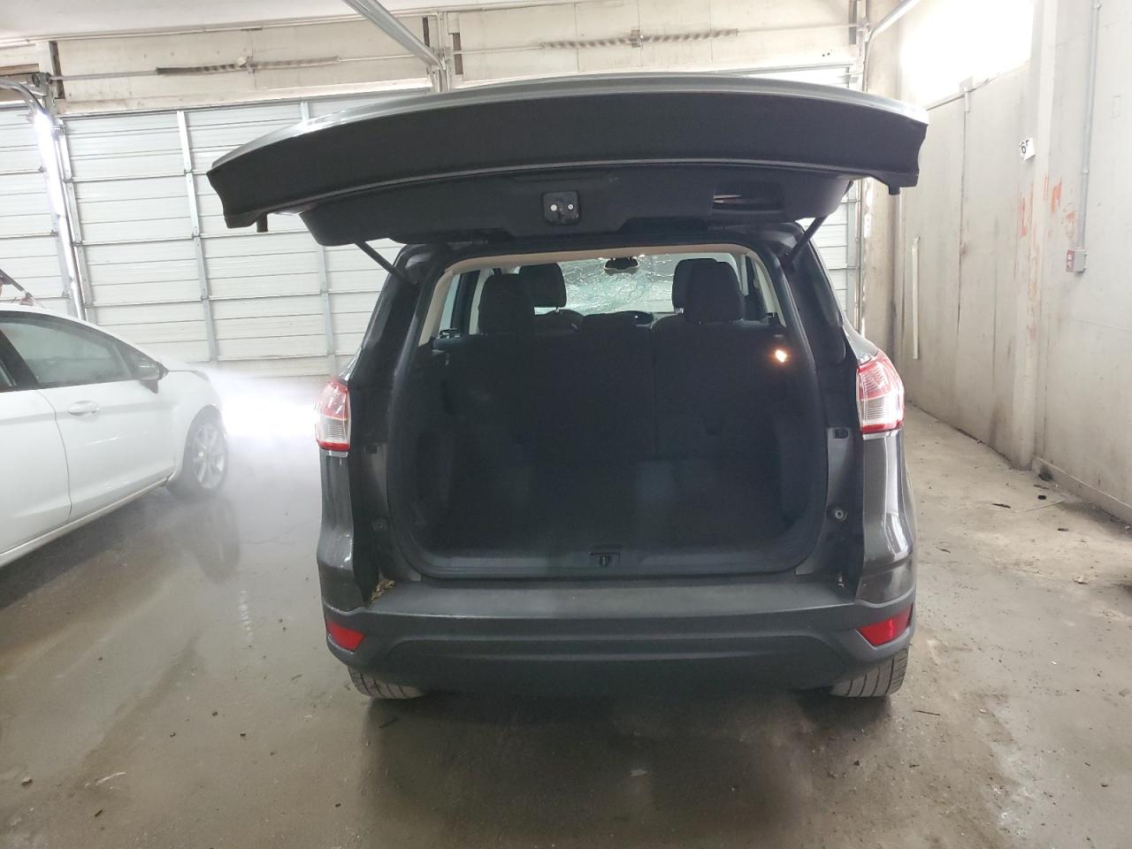 2016 Ford Escape VIN 1FMCU0F79GUC50258 Copart auction photo, top/roof / rear end damage thumbnail 6
