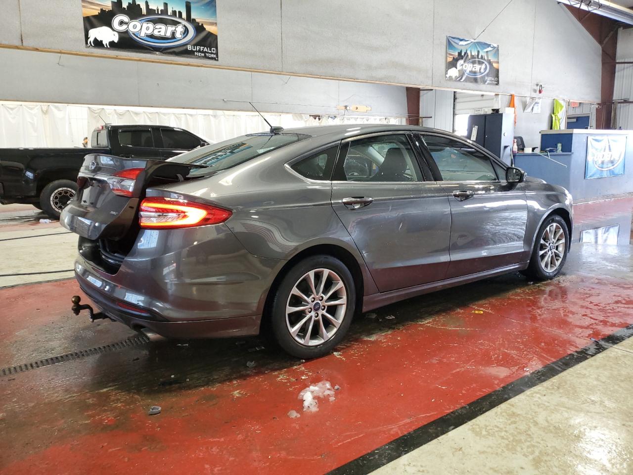 2017 Ford Fusion VIN 3FA6P0H7XHR394888 Copart auction photo, side / rear end damage thumbnail 3
