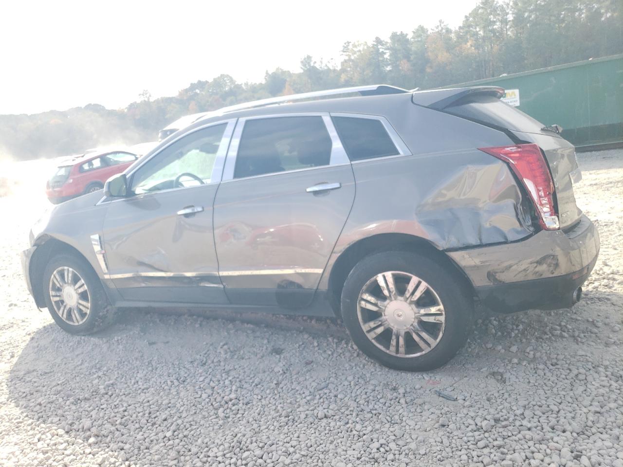 2012 Cadillac SRX VIN 3GYFNAE30CS502356 Copart auction photo, all over / undercarriage damage thumbnail 2