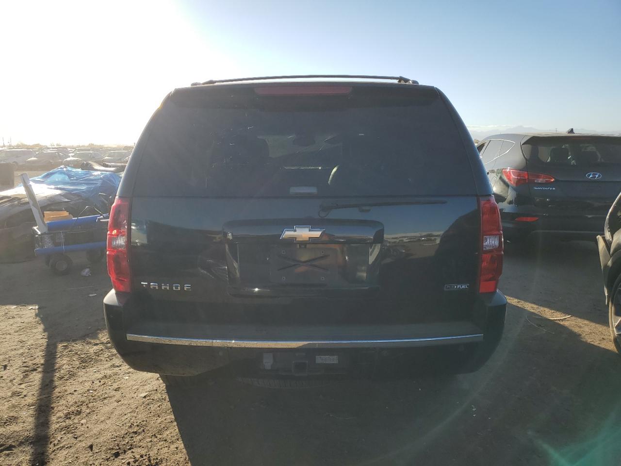 2009 Chevrolet Tahoe VIN 1GNFK33289R129834 Copart auction photo, front end / side damage thumbnail 6