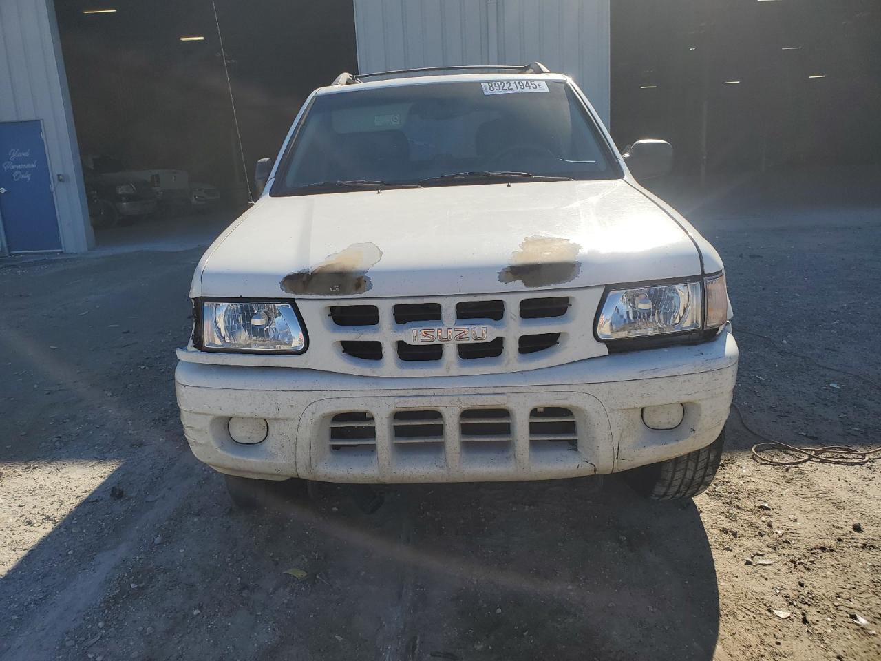 2001 Isuzu Rodeo VIN 4S2CK58W514310849 Copart auction photo, front end / minor dent/scratches damage thumbnail 5