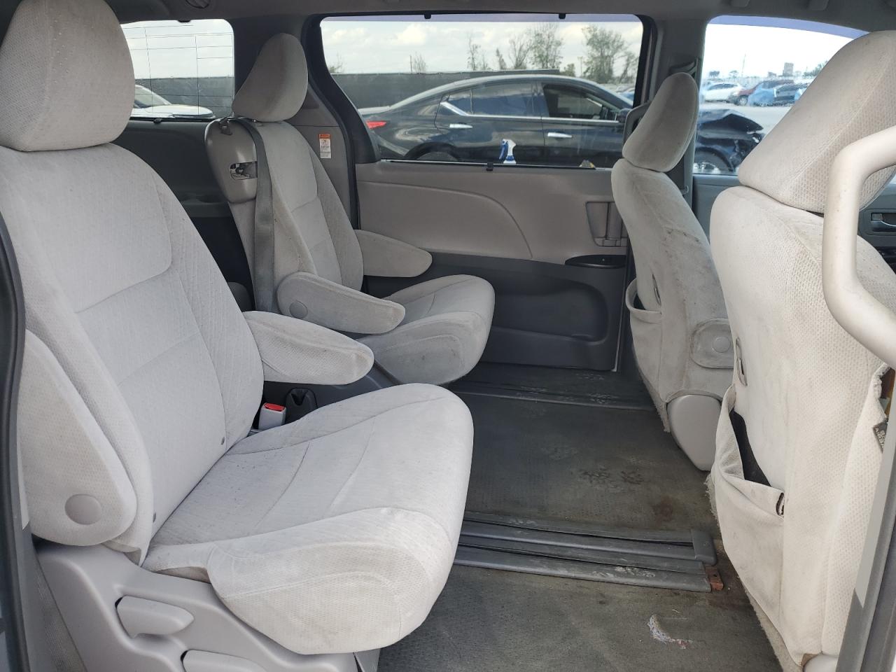 2015 Toyota Sienna VIN 5TDKK3DCXFS690175 Copart auction photo, front end / side damage thumbnail 11