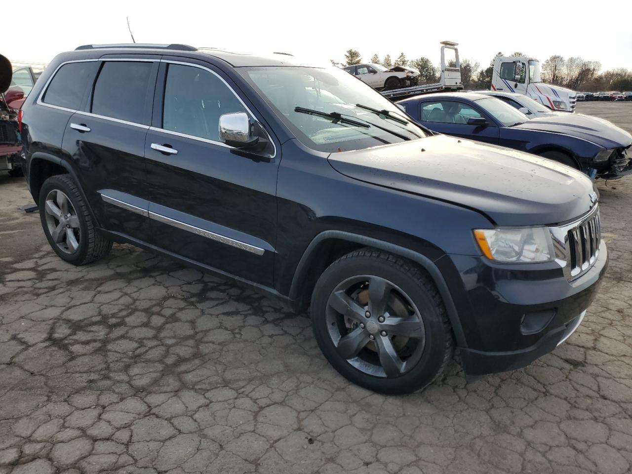 2011 Jeep Grand Cherokee VIN 1J4RR5GTXBC507431 Copart auction photo, vandalism / side damage thumbnail 4