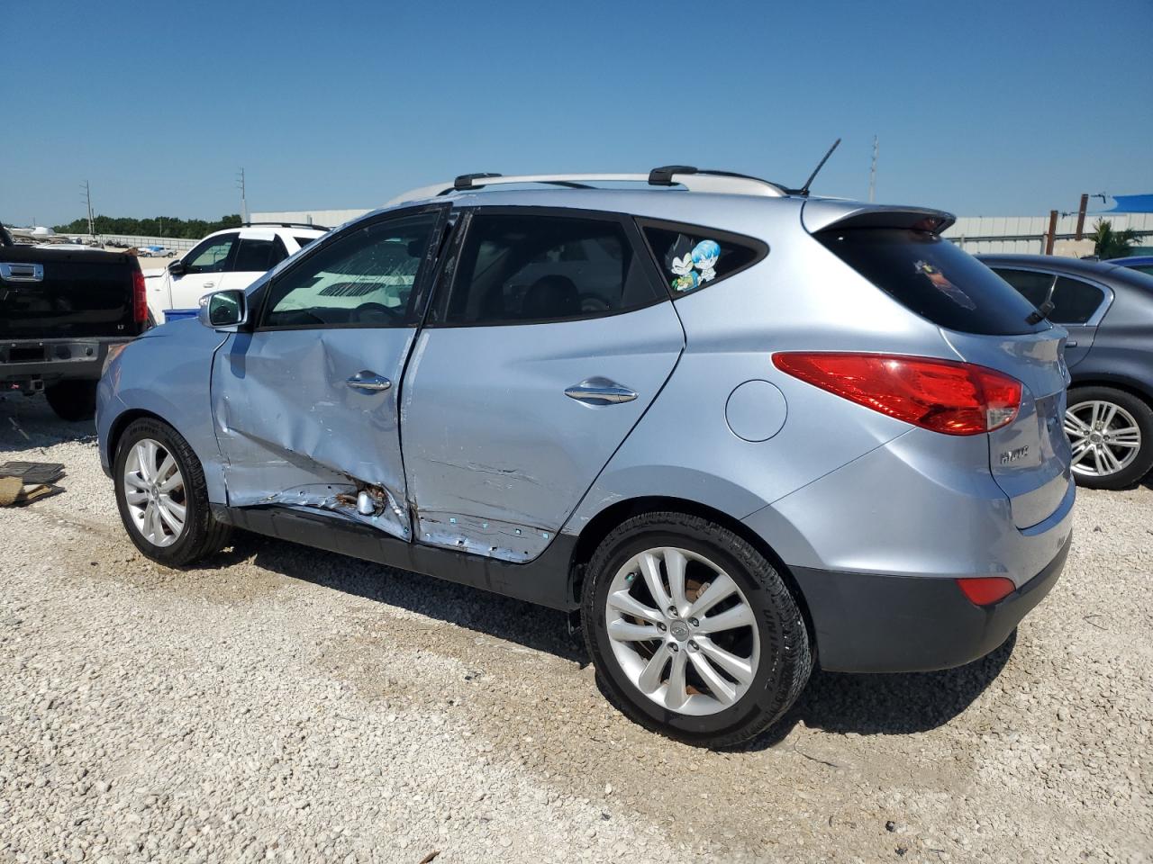2012 Hyundai Tucson VIN KM8JU3ACXCU363966 Copart auction photo, side / minor dent/scratches damage thumbnail 2