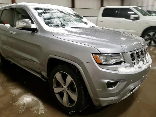 2015 Jeep Grand Cherokee VIN 1C4RJFCG3FC955558 Copart auction photo, side damage thumbnail 14