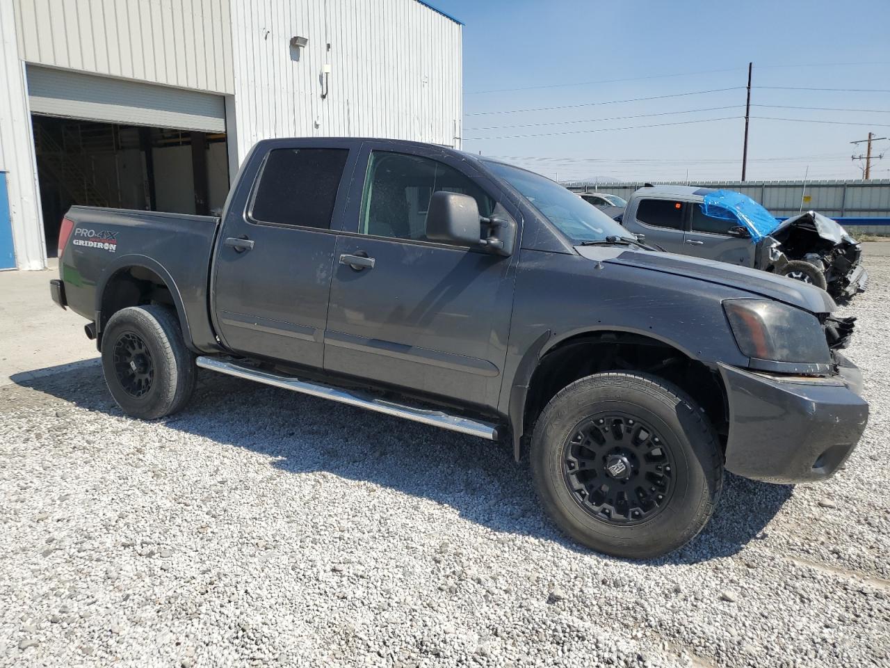 2009 Nissan Titan VIN 1N6AA07C89N311741 Copart auction photo, all over damage thumbnail 4
