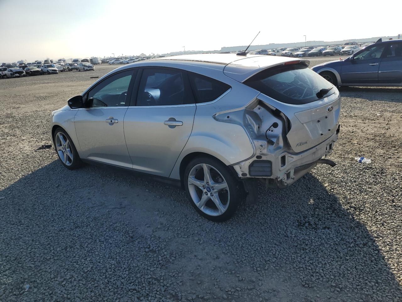 2012 Ford Focus VIN 1FAHP3N22CL189575 Copart auction photo, rear end damage thumbnail 2