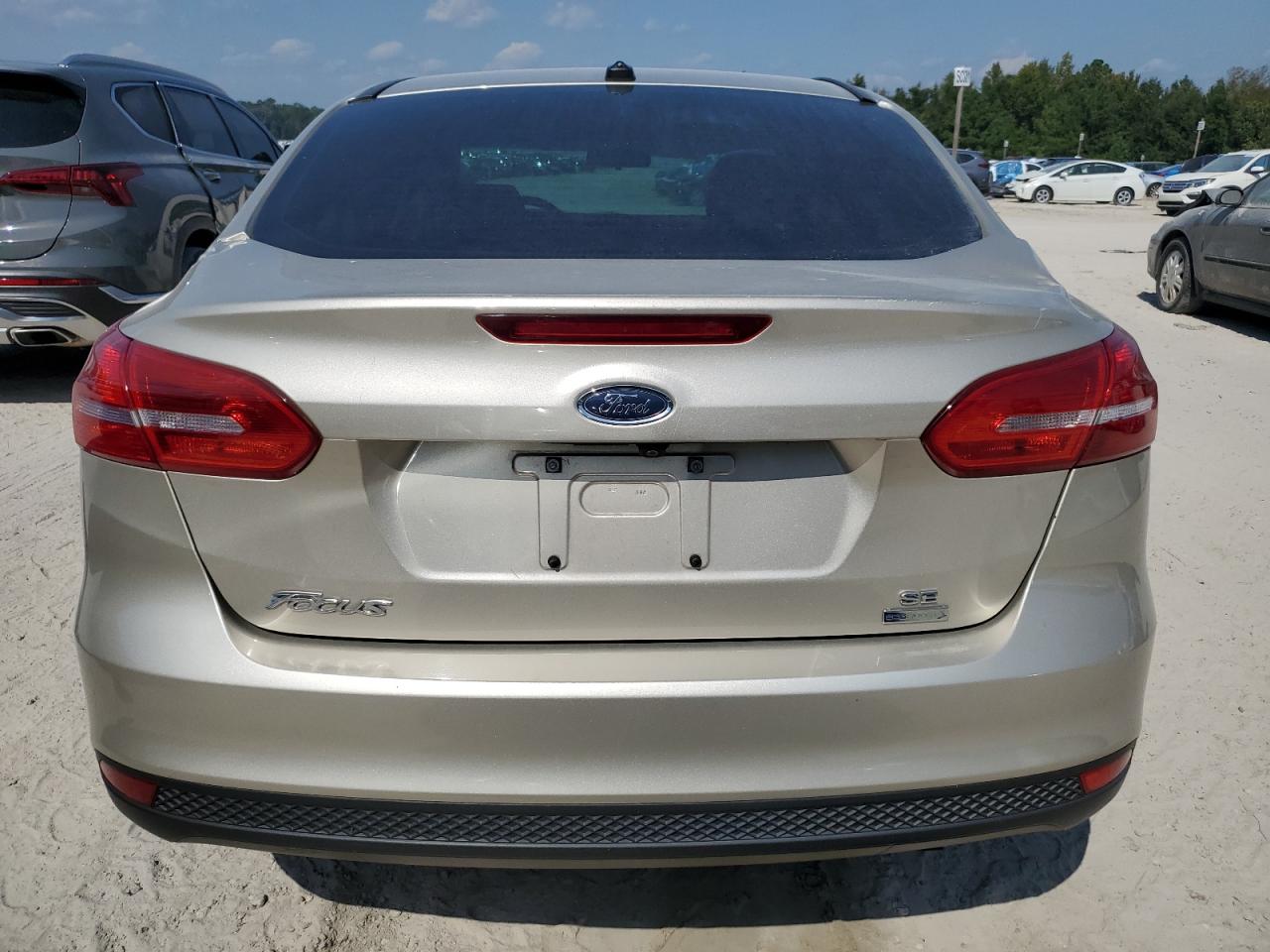 2018 Ford Focus VIN 1FADP3FE1JL319690 Copart auction photo, minor dent/scratches damage thumbnail 6