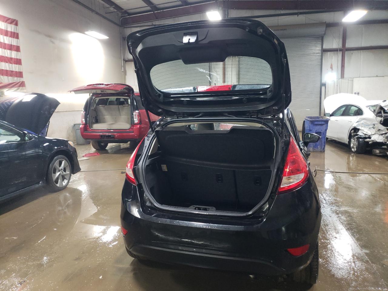 2013 Ford Fiesta VIN 3FADP4TJXDM214012 Copart auction photo, side / minor dent/scratches damage thumbnail 6