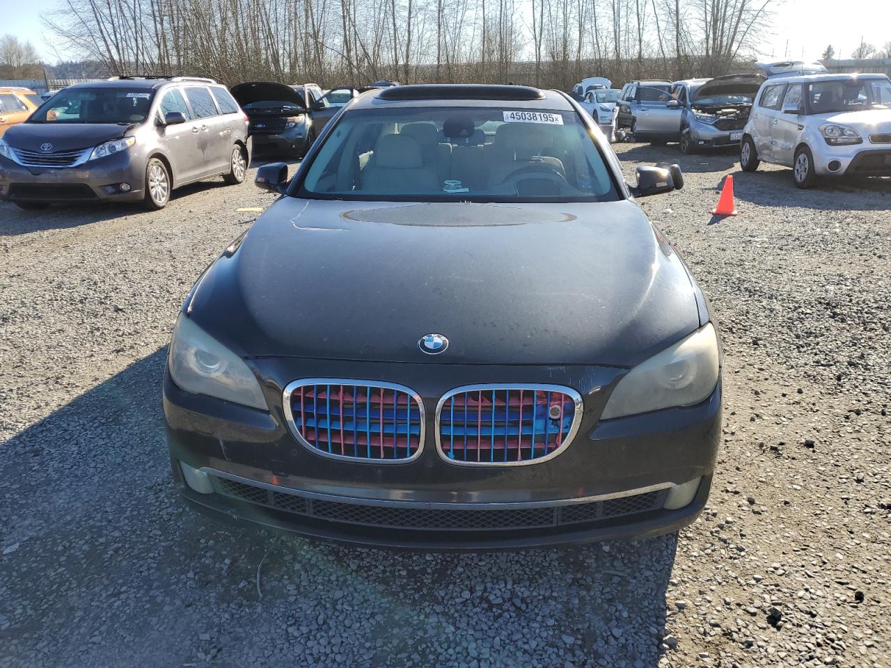 2010 BMW 7er VIN WBAKB0C51ACY40084 Copart auction photo, side damage thumbnail 5