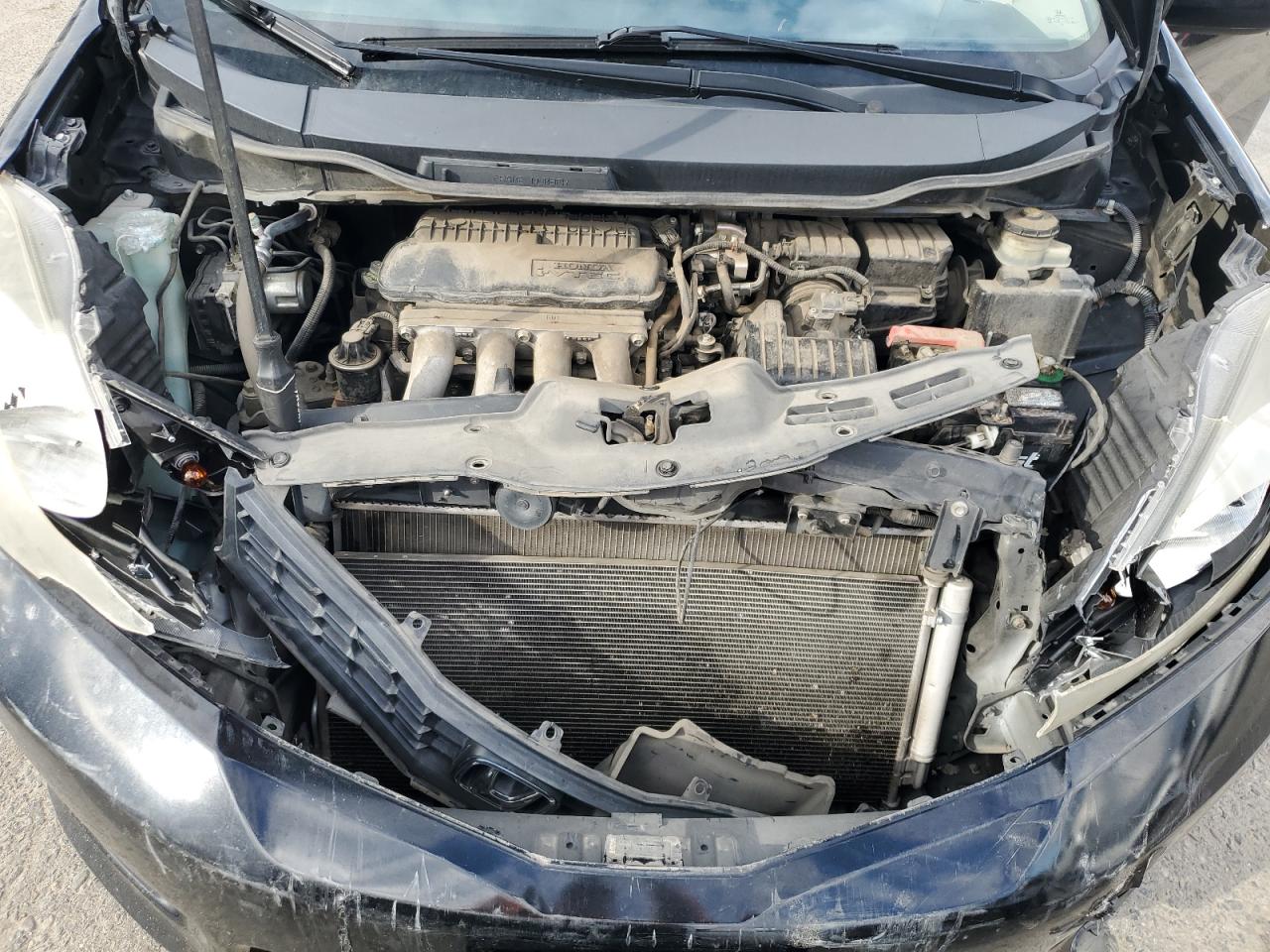 2012 Honda Fit VIN JHMGE8H52CC012280 Copart auction photo, front end damage thumbnail 11