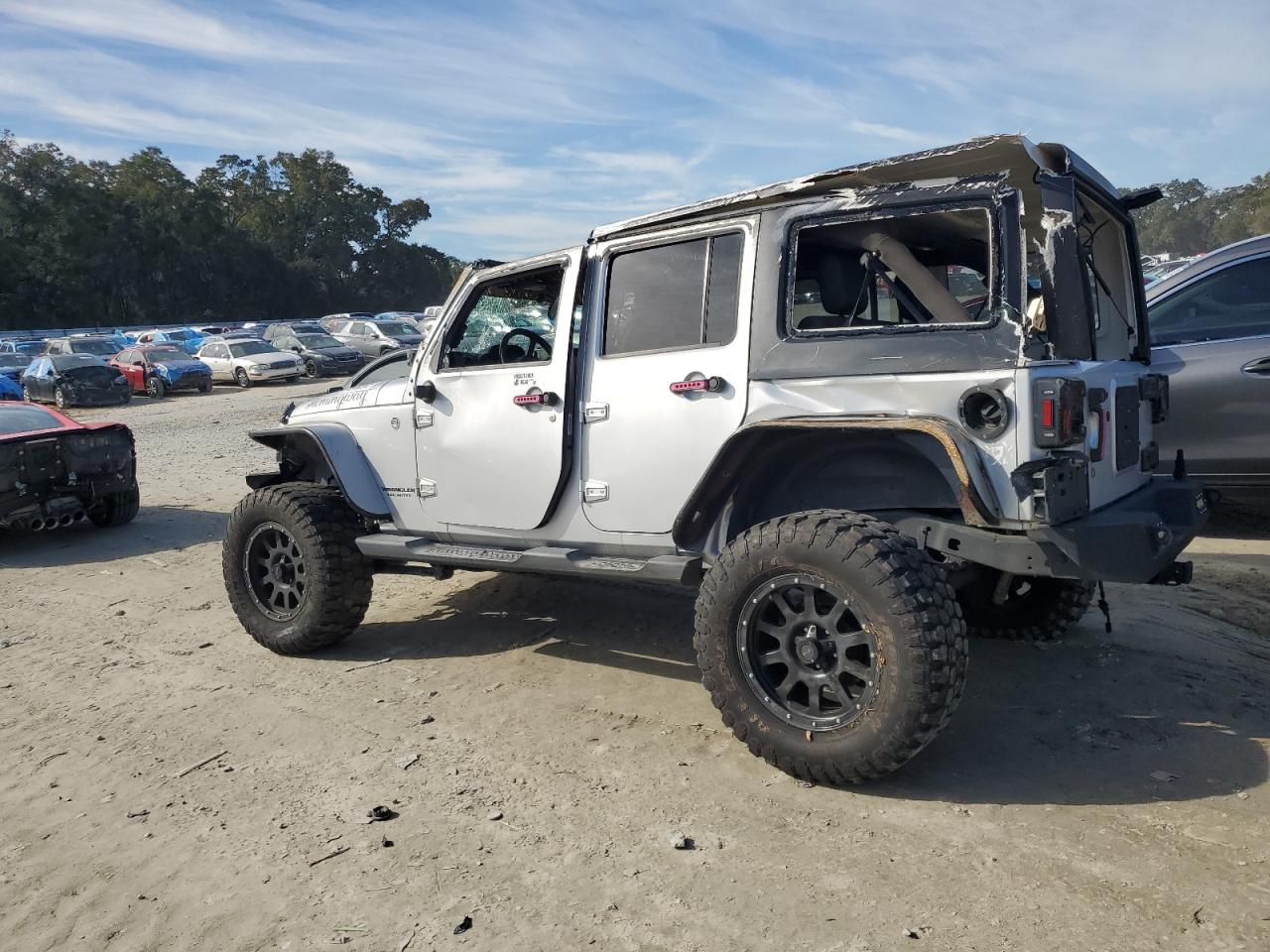 2010 Jeep Wrangler VIN 1J4BA3H11AL161777 Copart auction photo, all over damage thumbnail 2