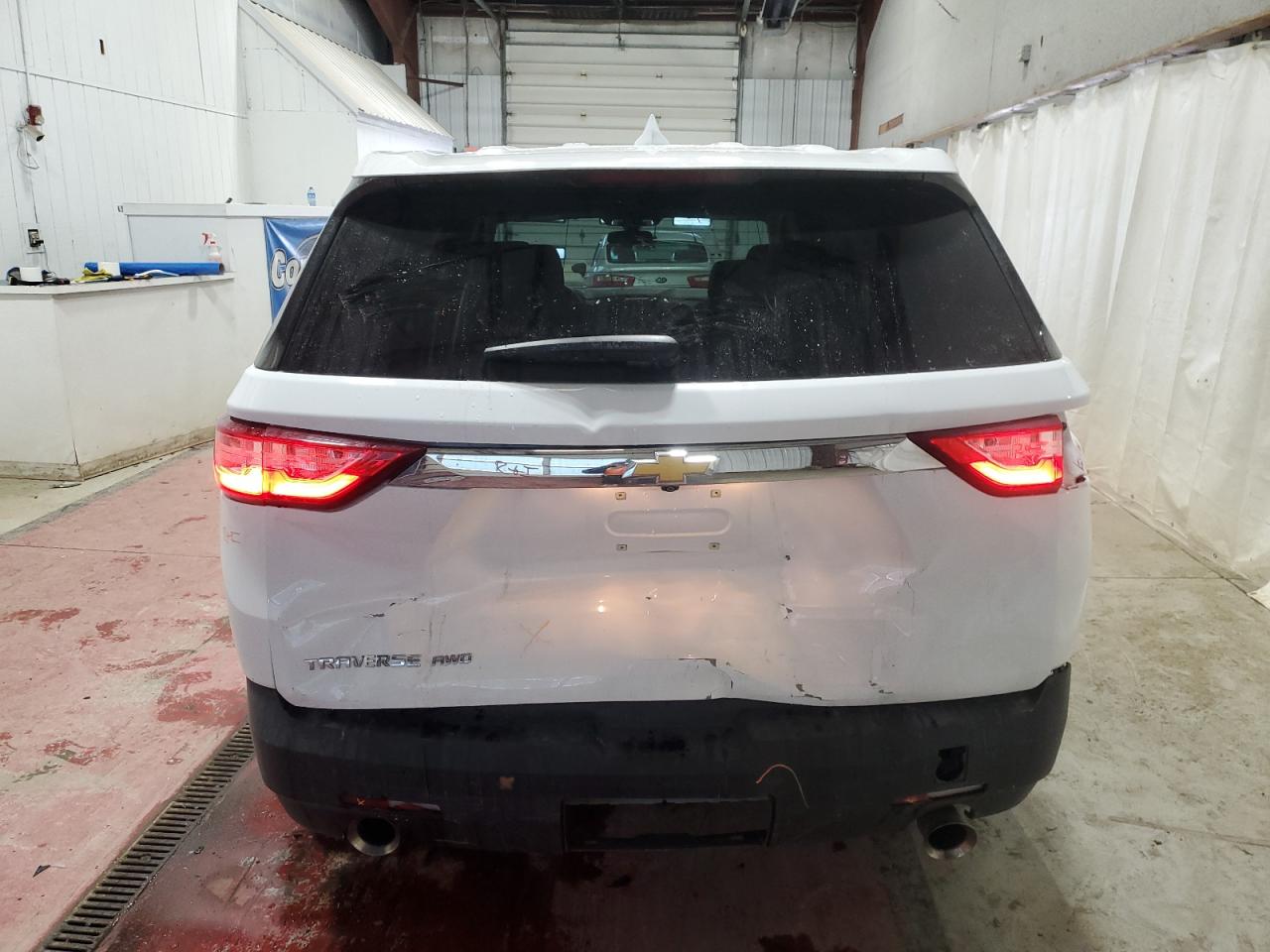 2020 Chevrolet Traverse VIN 1GNEVFKW8LJ146003 Copart auction photo, rear end damage thumbnail 6