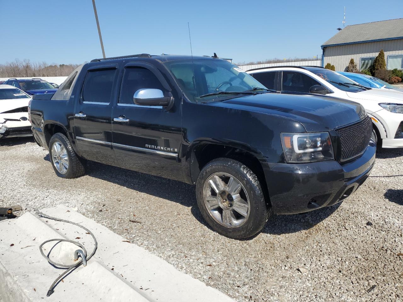 2009 Chevrolet Avalanche VIN 3GNFK32009G233718 Copart auction photo, rear end damage thumbnail 4