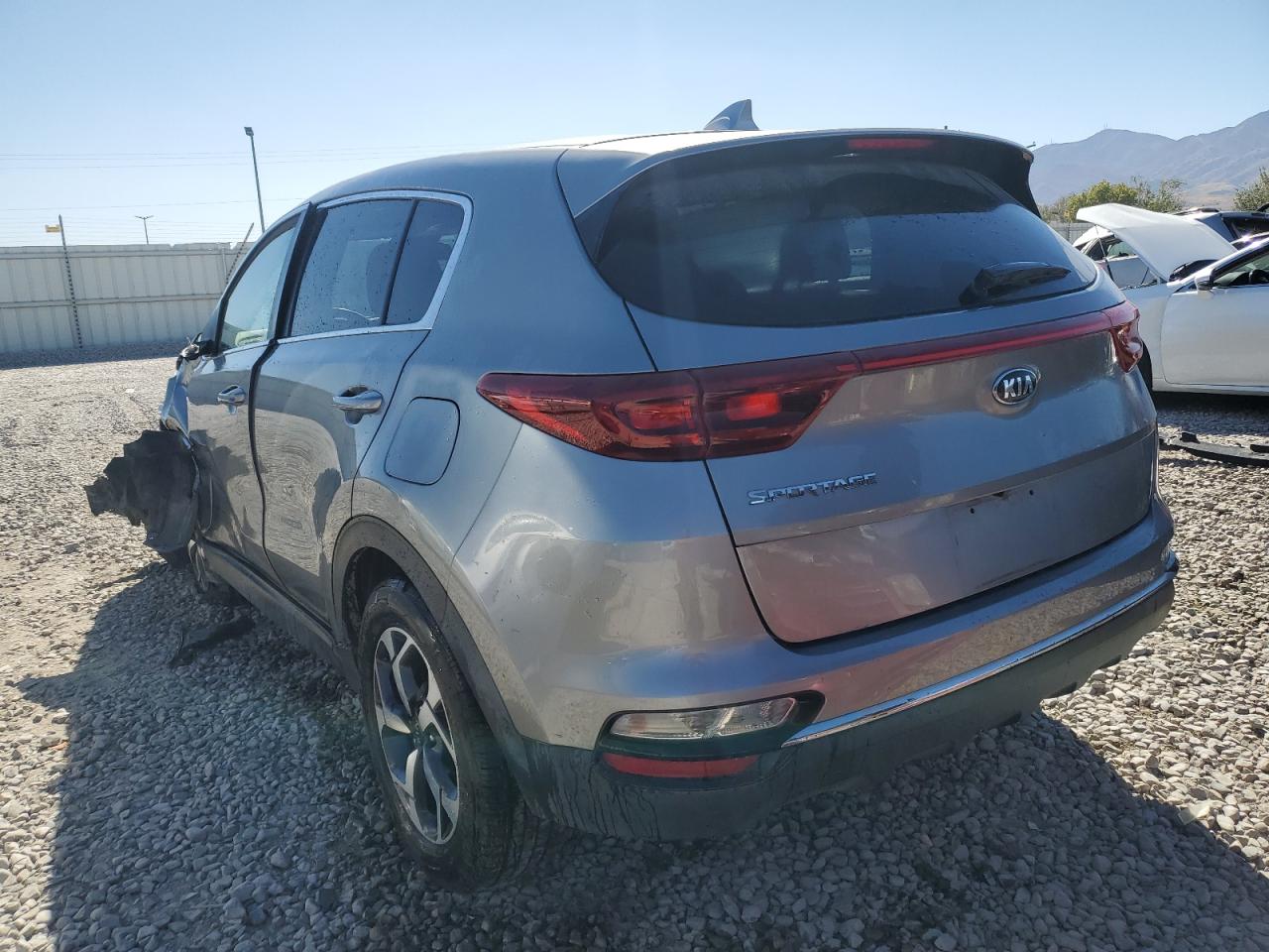 2021 KIA Sportage VIN KNDPMCAC9M7882814 Copart auction photo, side / front end damage thumbnail 2