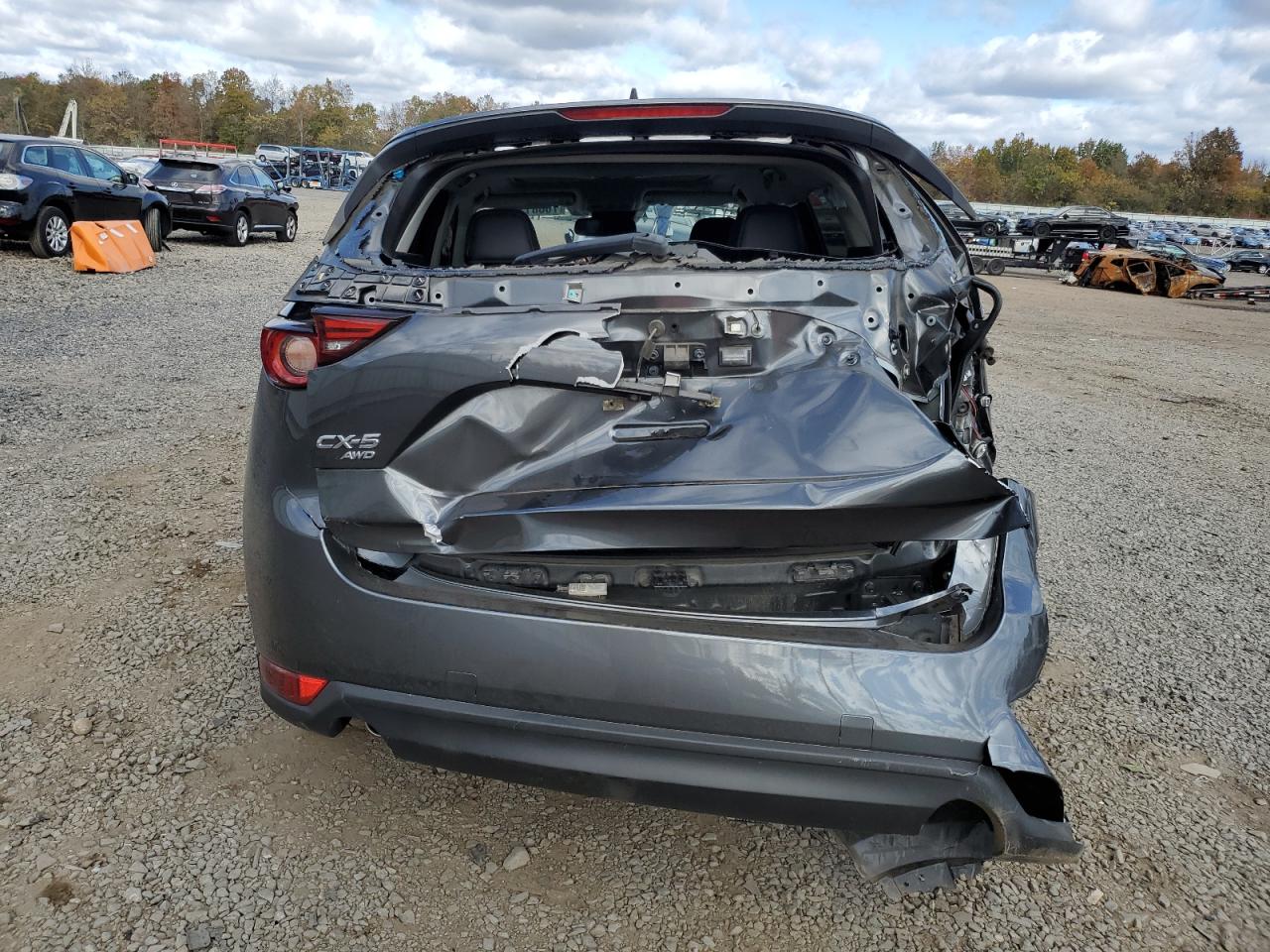 2019 Mazda CX-5 VIN JM3KFBDMXK0589830 Copart auction photo, all over damage thumbnail 6