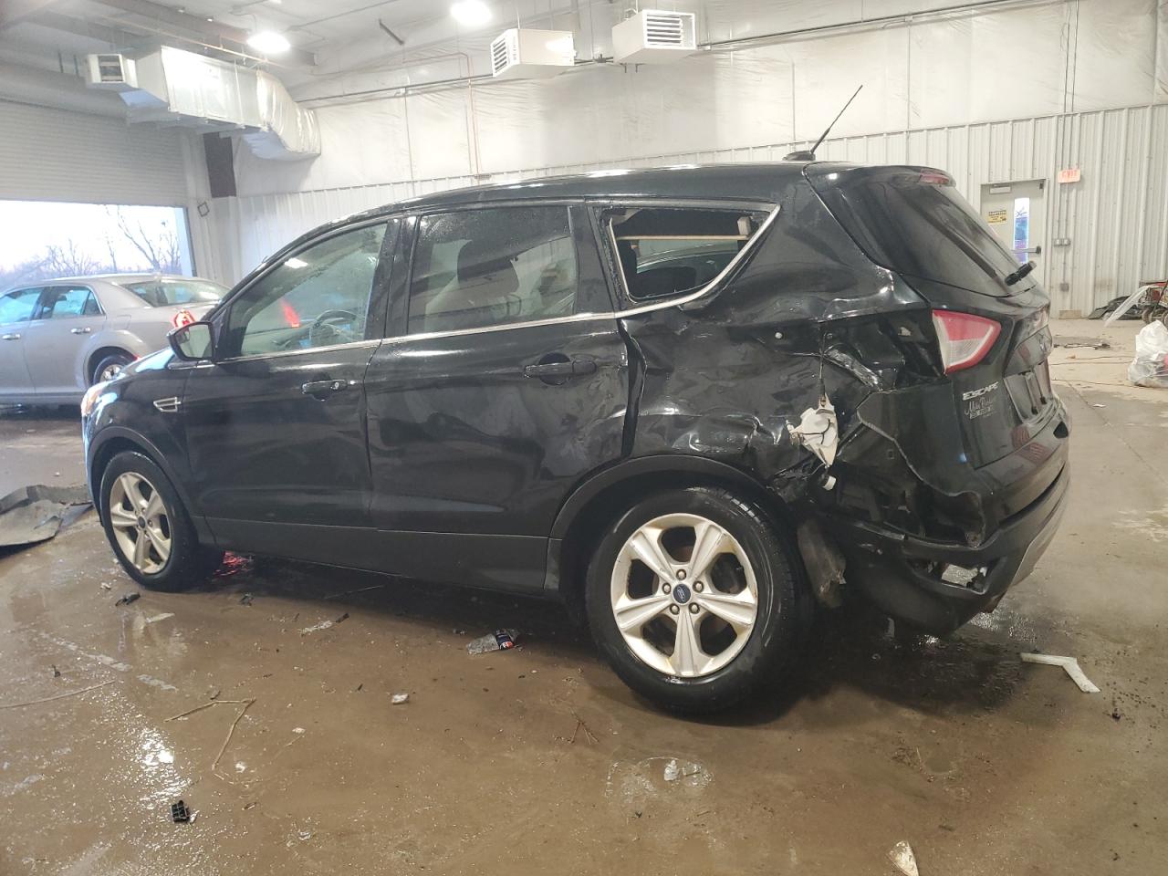 2015 Ford Escape VIN 1FMCU9GX4FUC25592 Copart auction photo, all over damage thumbnail 2