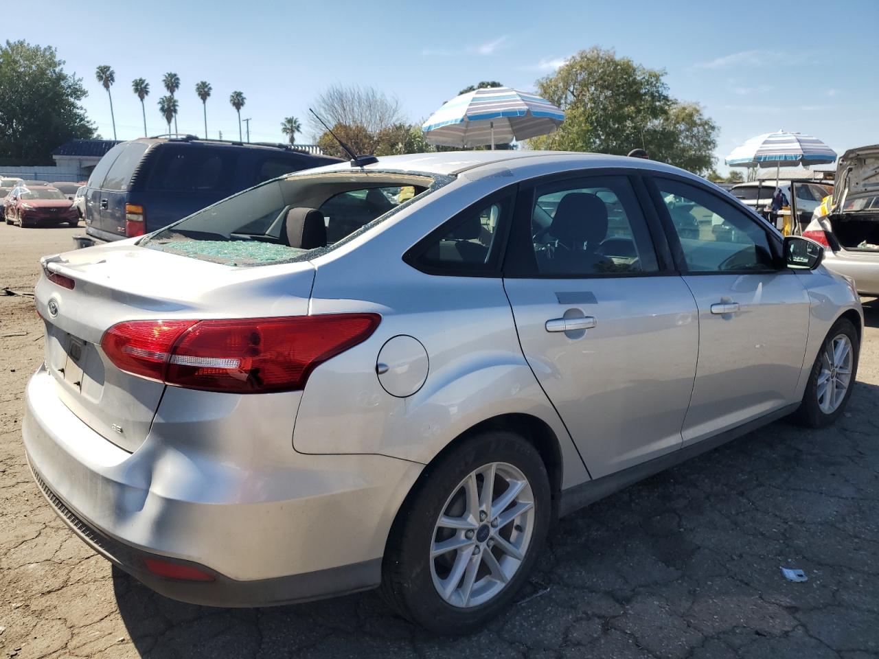 2015 Ford Focus VIN 1FADP3F20FL348725 Copart auction photo, water/flood damage thumbnail 3