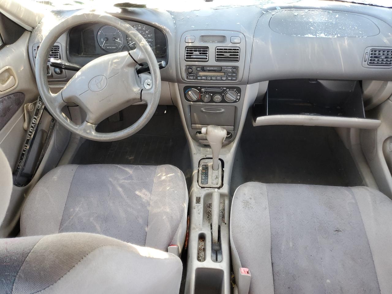 1999 Toyota Corolla VIN 1NXBR12E1XZ245787 Copart auction photo, all over damage thumbnail 8