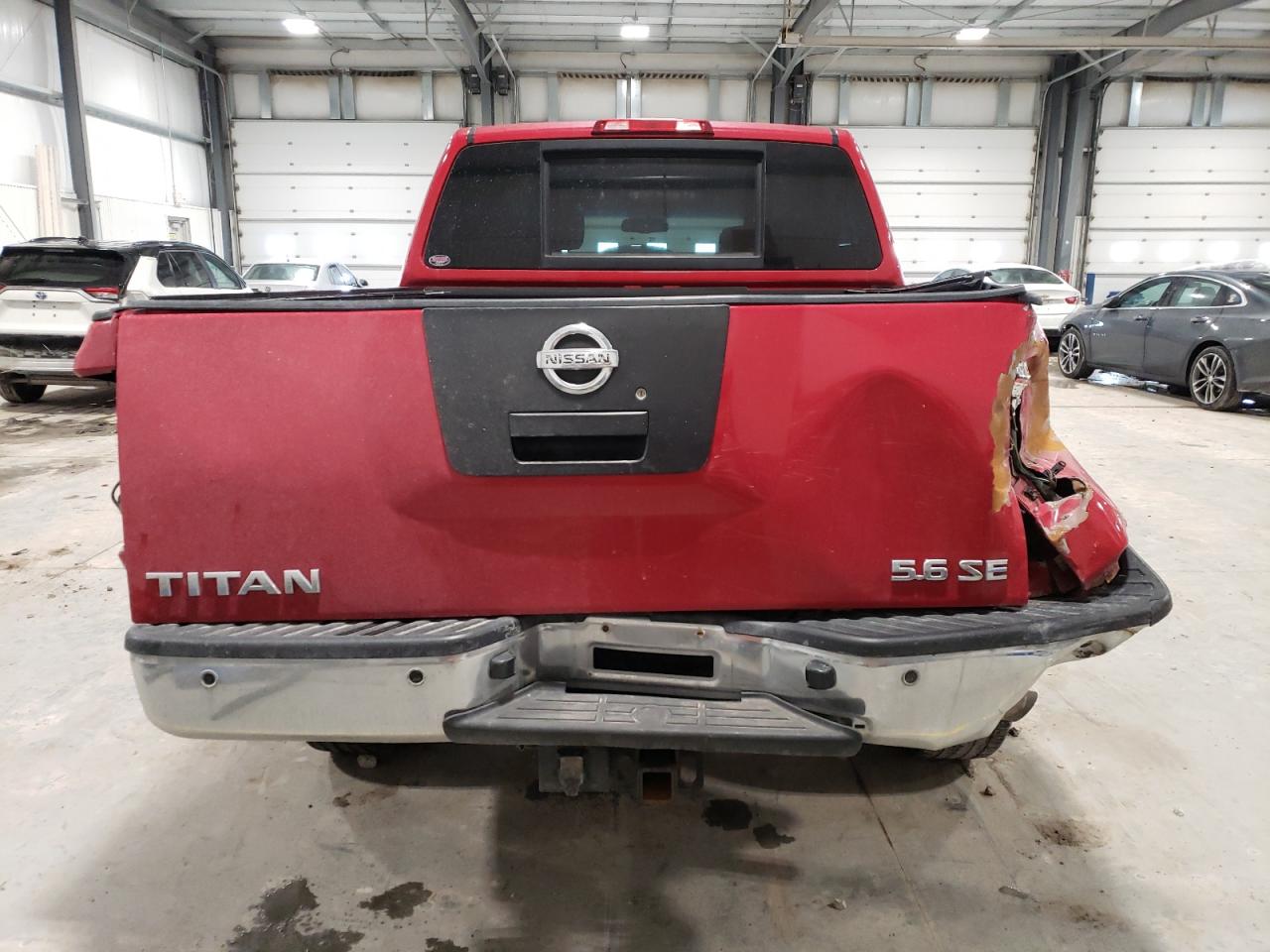 2010 Nissan Titan VIN 1N6BA0EC3AN310475 Copart auction photo, all over damage thumbnail 6