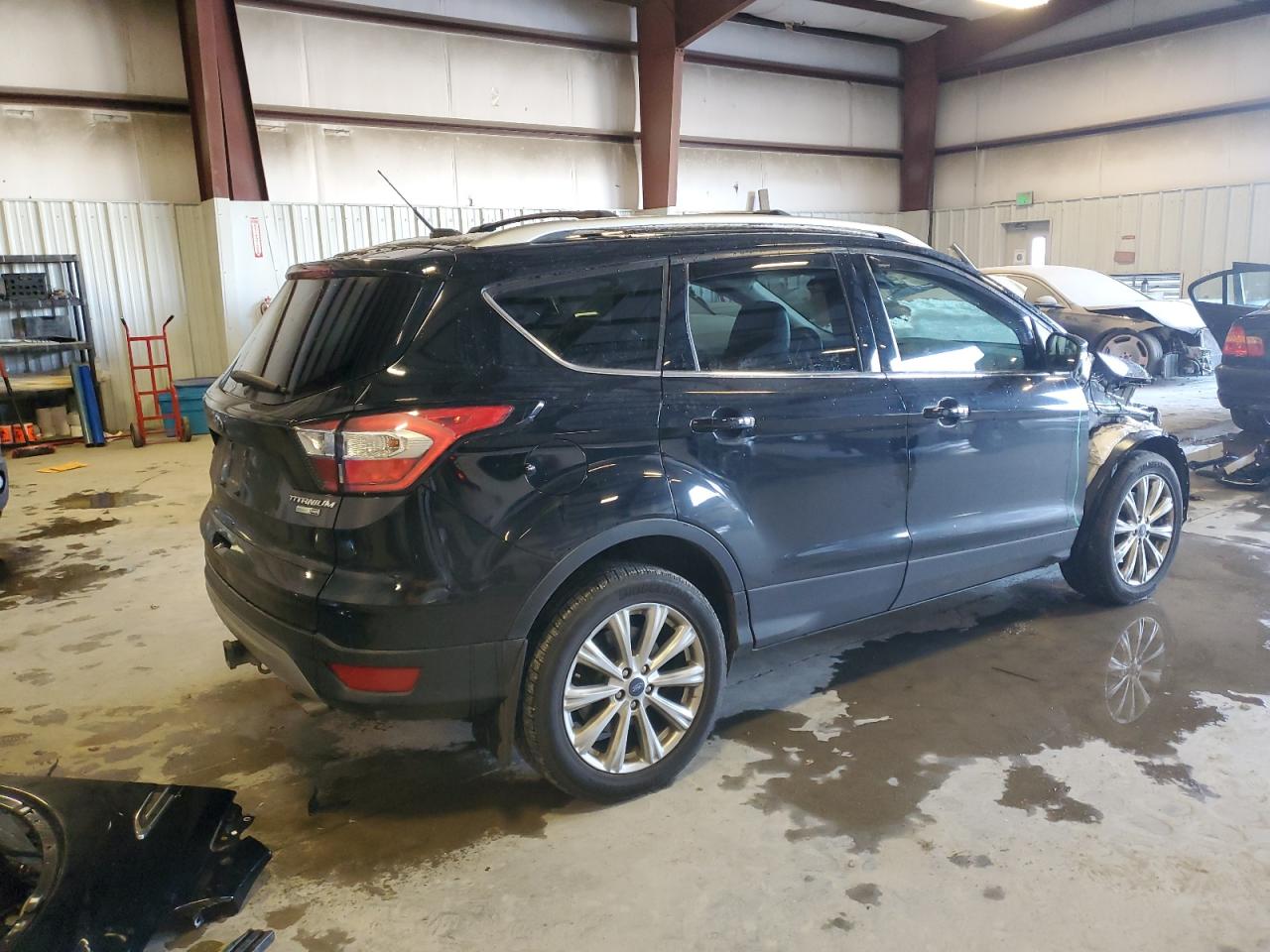 2017 Ford Escape VIN 1FMCU9J99HUE48515 Copart auction photo, front end / side damage thumbnail 3