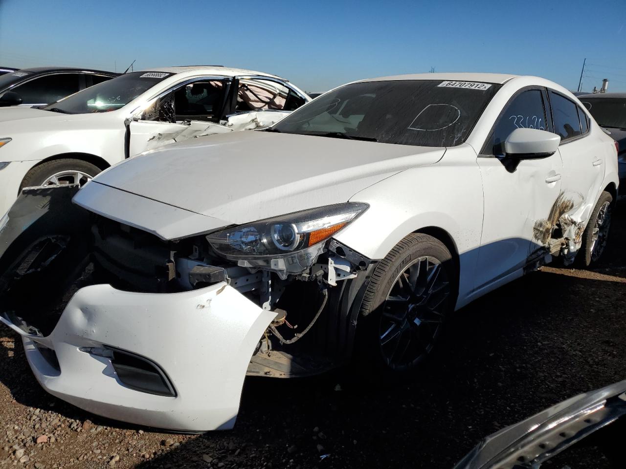 2017 Mazda 3 VIN 3MZBN1U74HM102060 Copart auction photo, side / front end damage thumbnail 2