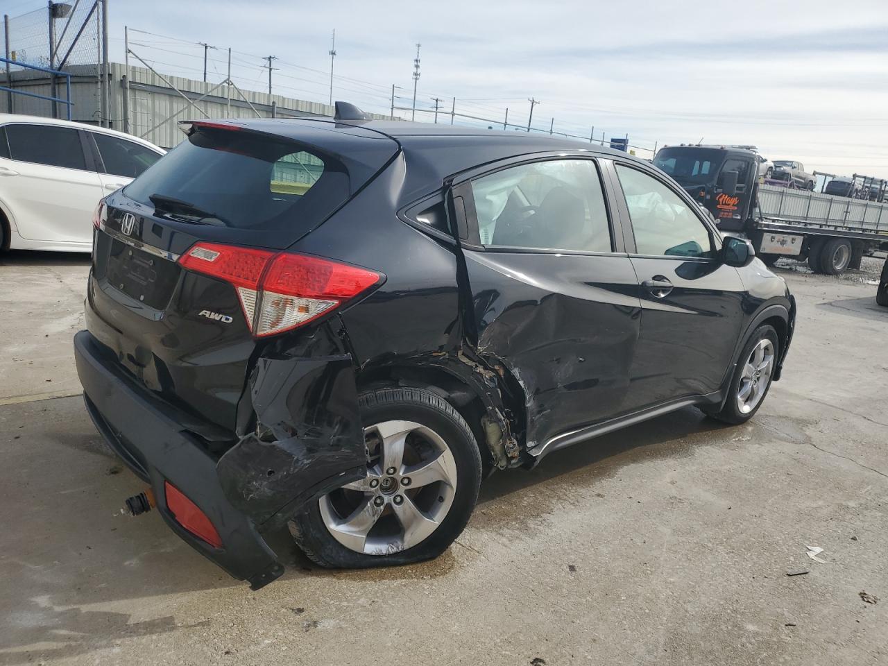2022 Honda HR-V VIN 3CZRU6H33NM702020 Copart auction photo, side / rear end damage thumbnail 3
