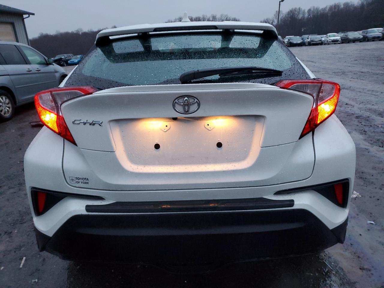 2021 Toyota C-HR VIN NMTKHMBX2MR126283 Copart auction photo, front end / undercarriage damage thumbnail 6