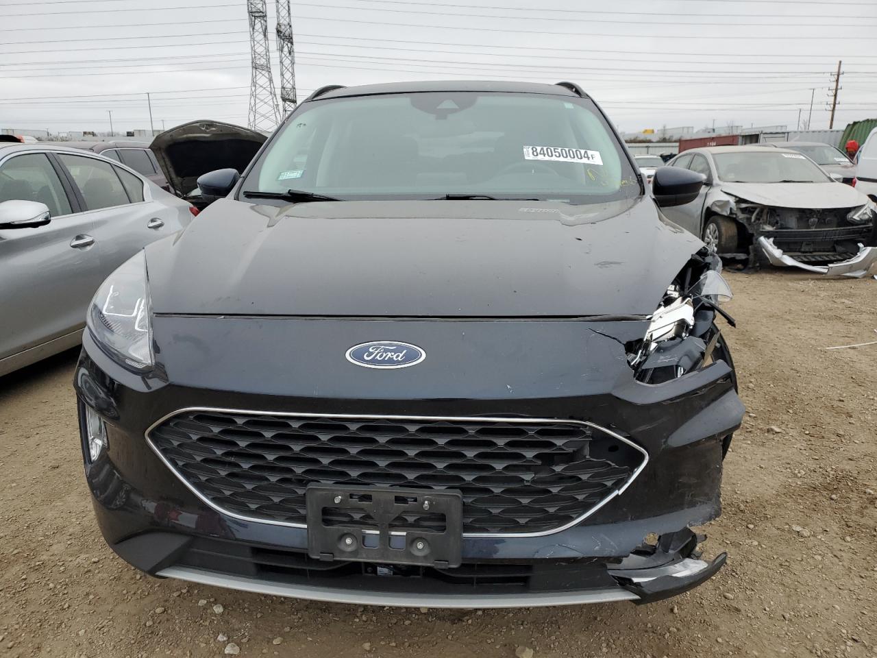 2021 Ford Escape VIN 1FMCU9H67MUA79336 Copart auction photo, front end / undercarriage damage thumbnail 5