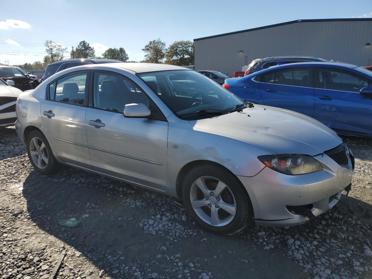 2006 Mazda 3 VIN JM1BK12F361474649 Copart auction photo, front end / rear end damage thumbnail 4