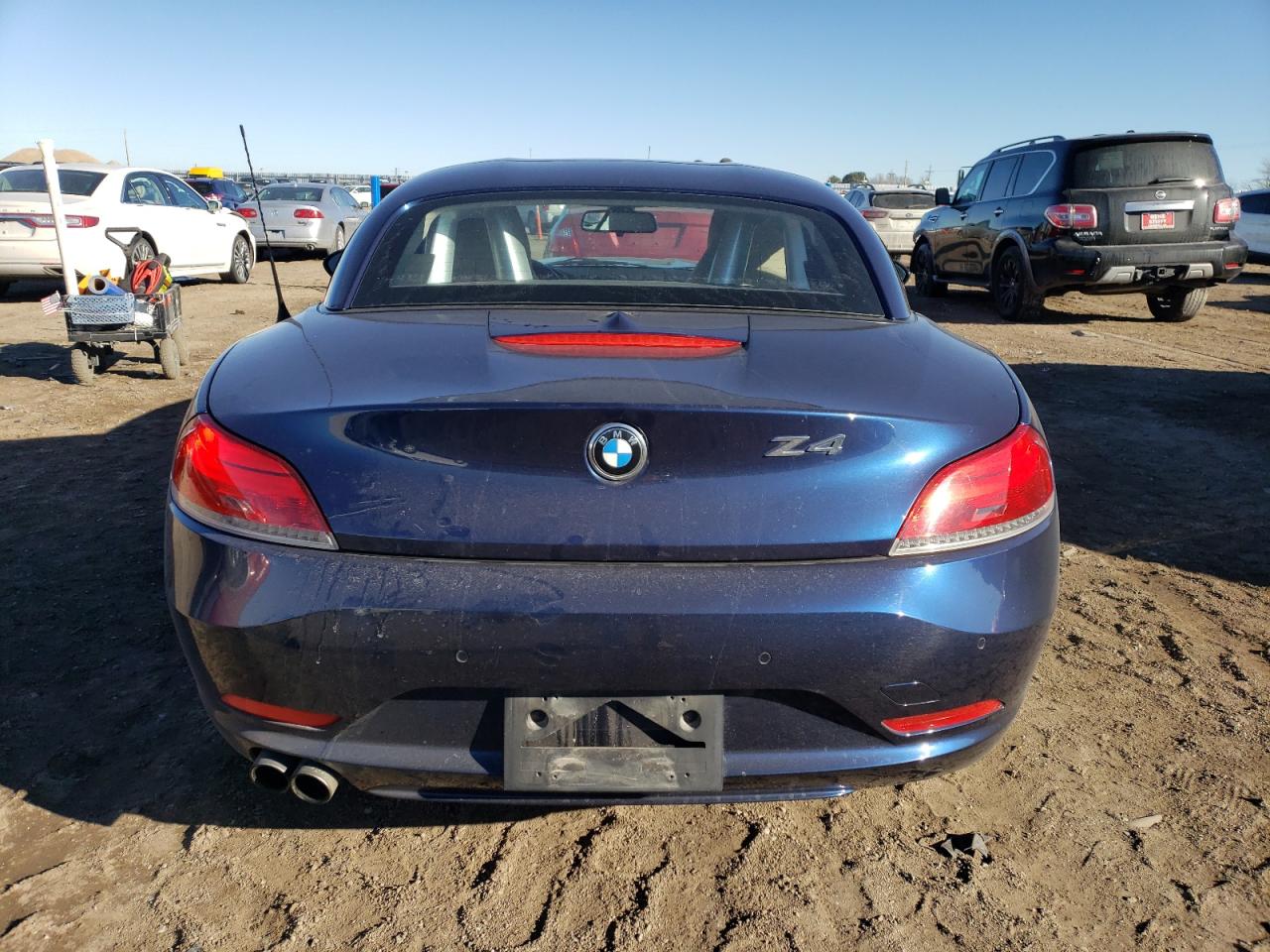 2011 BMW Z4 VIN WBALM5C58BE379080 Copart auction photo, front end damage thumbnail 6