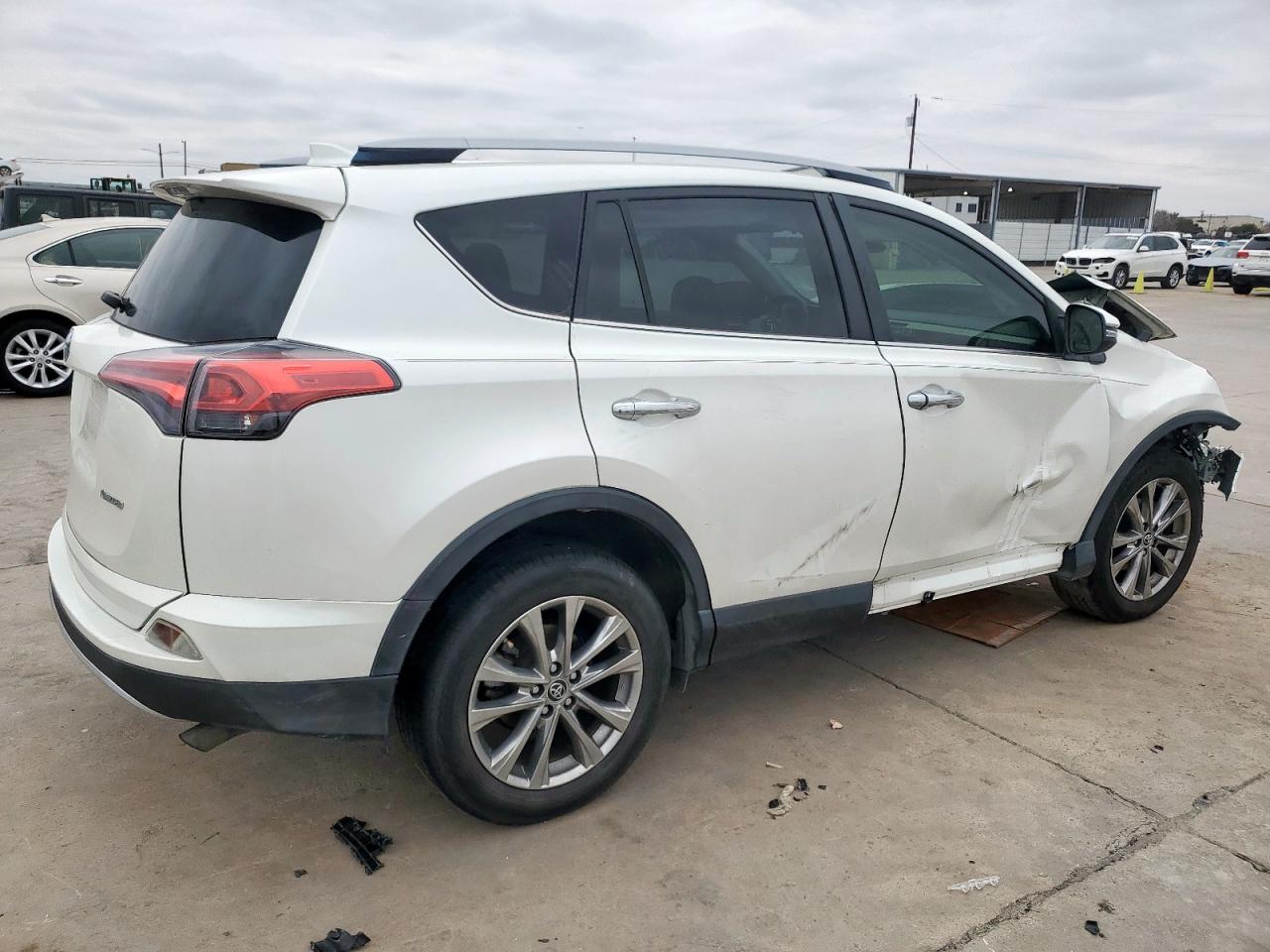 2018 Toyota RAV 4 VIN JTMYFREVXJD127729 Copart auction photo, front end / side damage thumbnail 3