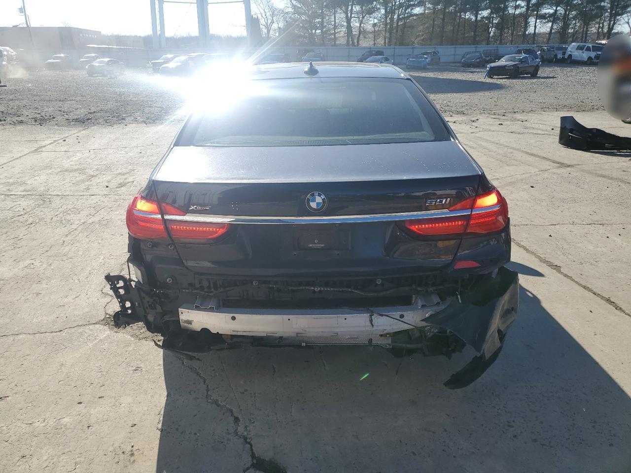 2016 BMW 7er VIN WBA7F2C55GG416656 Copart auction photo, rear end damage thumbnail 6