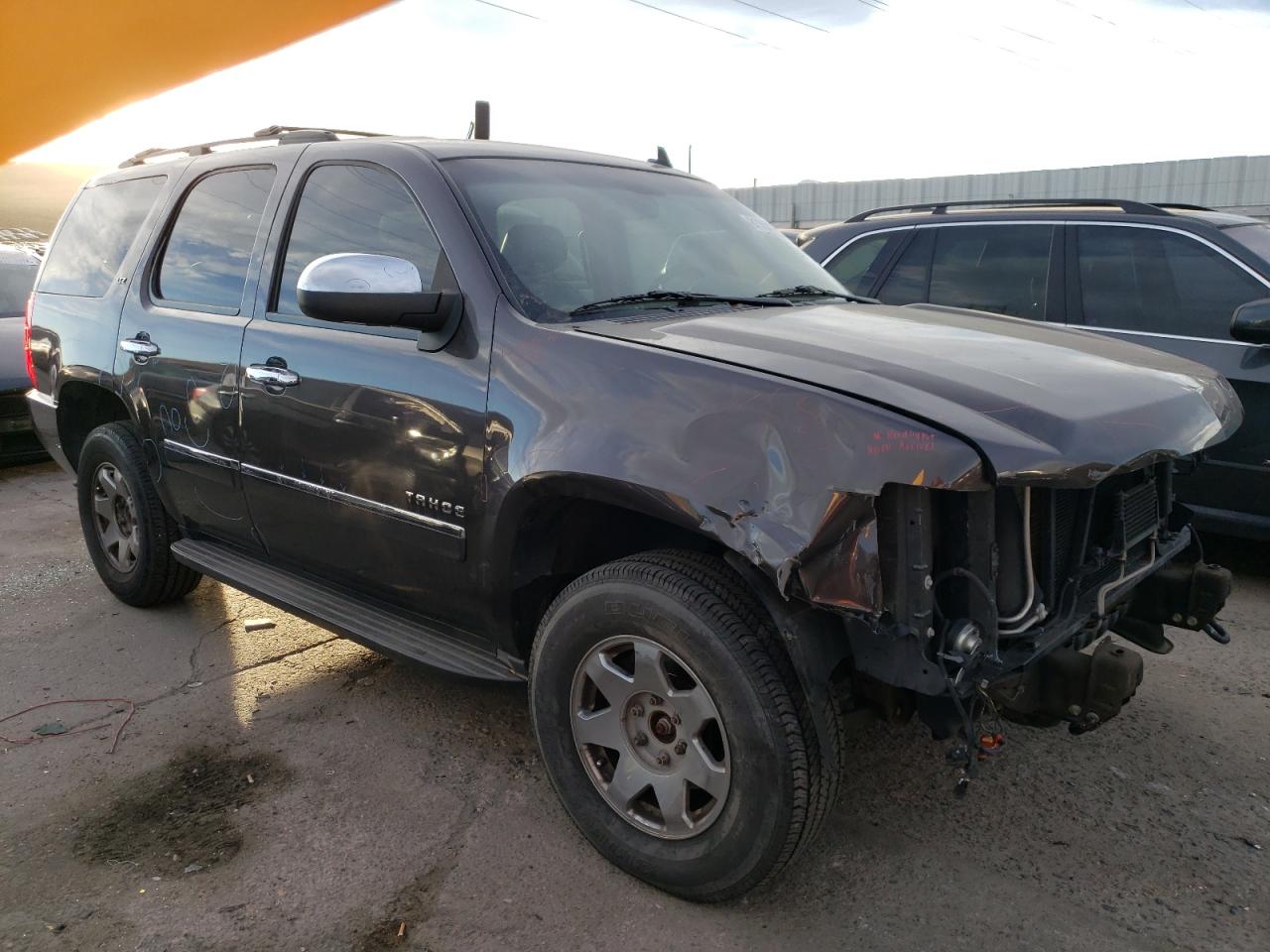 2010 Chevrolet Tahoe VIN 1GNUKCE03AR290194 Copart auction photo, front end / hail damage thumbnail 4