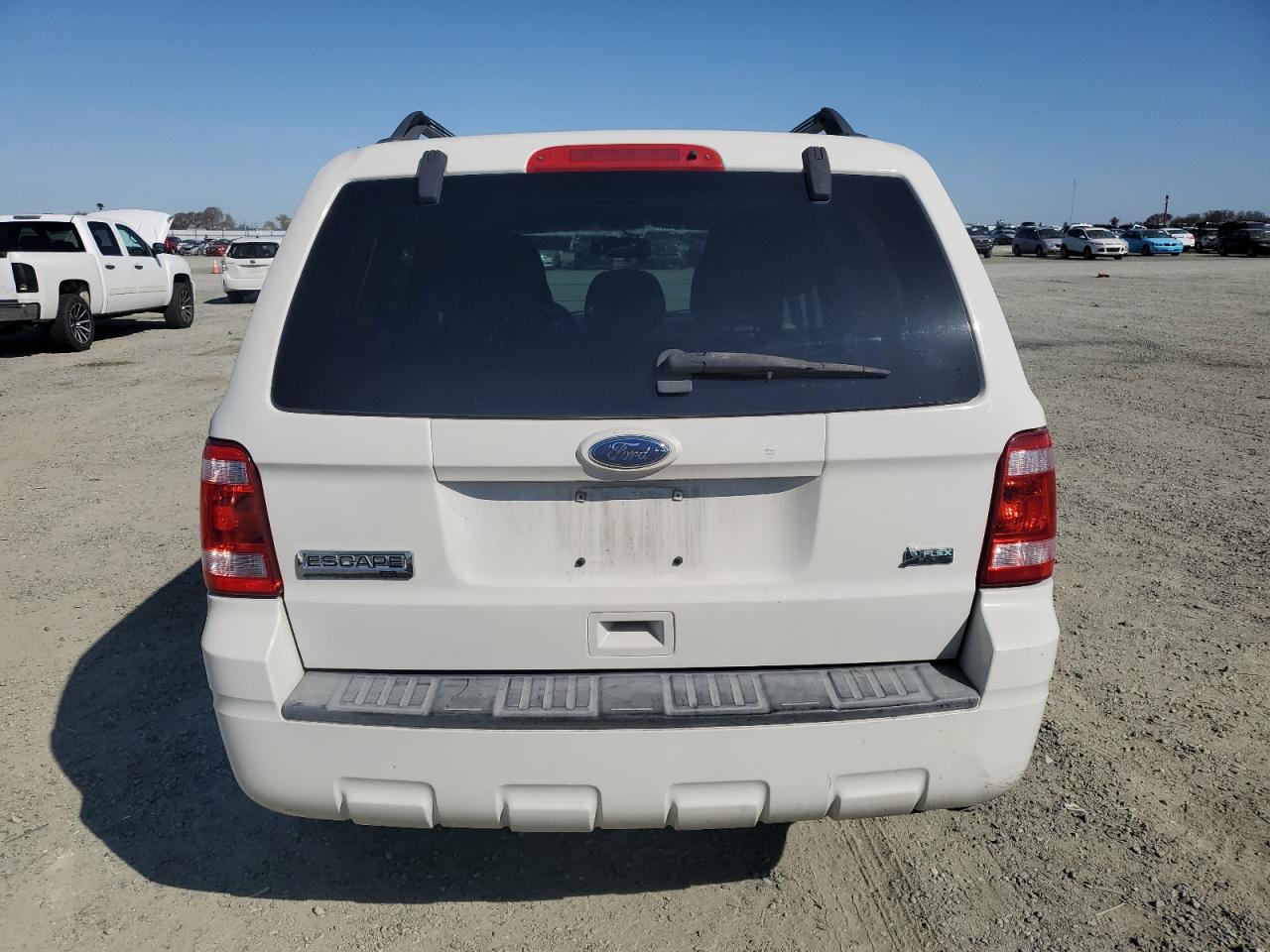 2011 Ford Escape VIN 1FMCU9DG0BKA07661 Copart auction photo, minor dent/scratches damage thumbnail 6