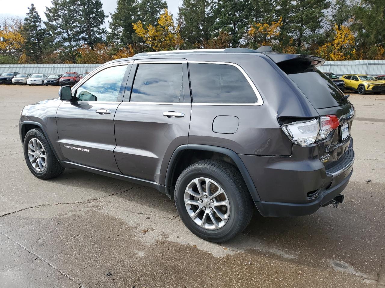 2015 Jeep Grand Cherokee VIN 1C4RJFBG5FC736294 Copart auction photo, rear end / minor dent/scratches damage thumbnail 2